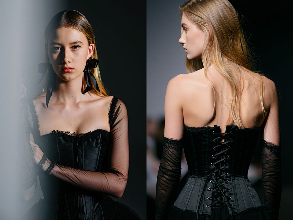 Vue face et dos corset noir lacé, lumière runway dramatique, visuel mode haute définition Reve Image 1.0.