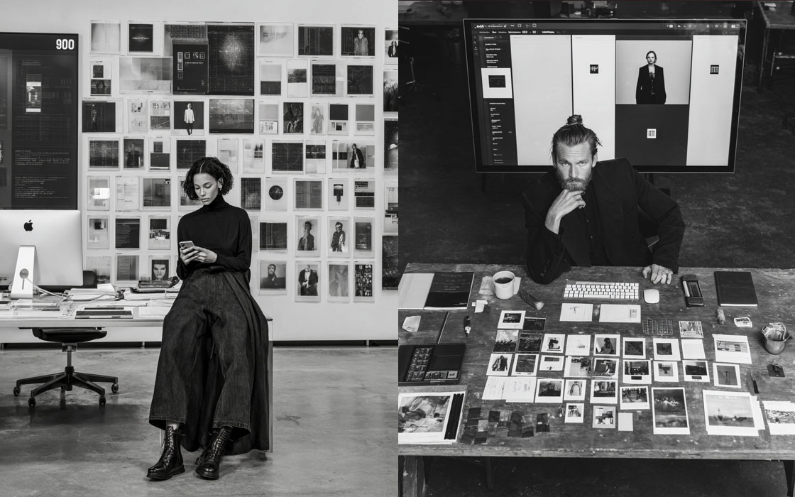 Mise en scène créative avec mur d'images : femme assise sur un bureau et homme vu en légère plongée au milieu de tirages photos.